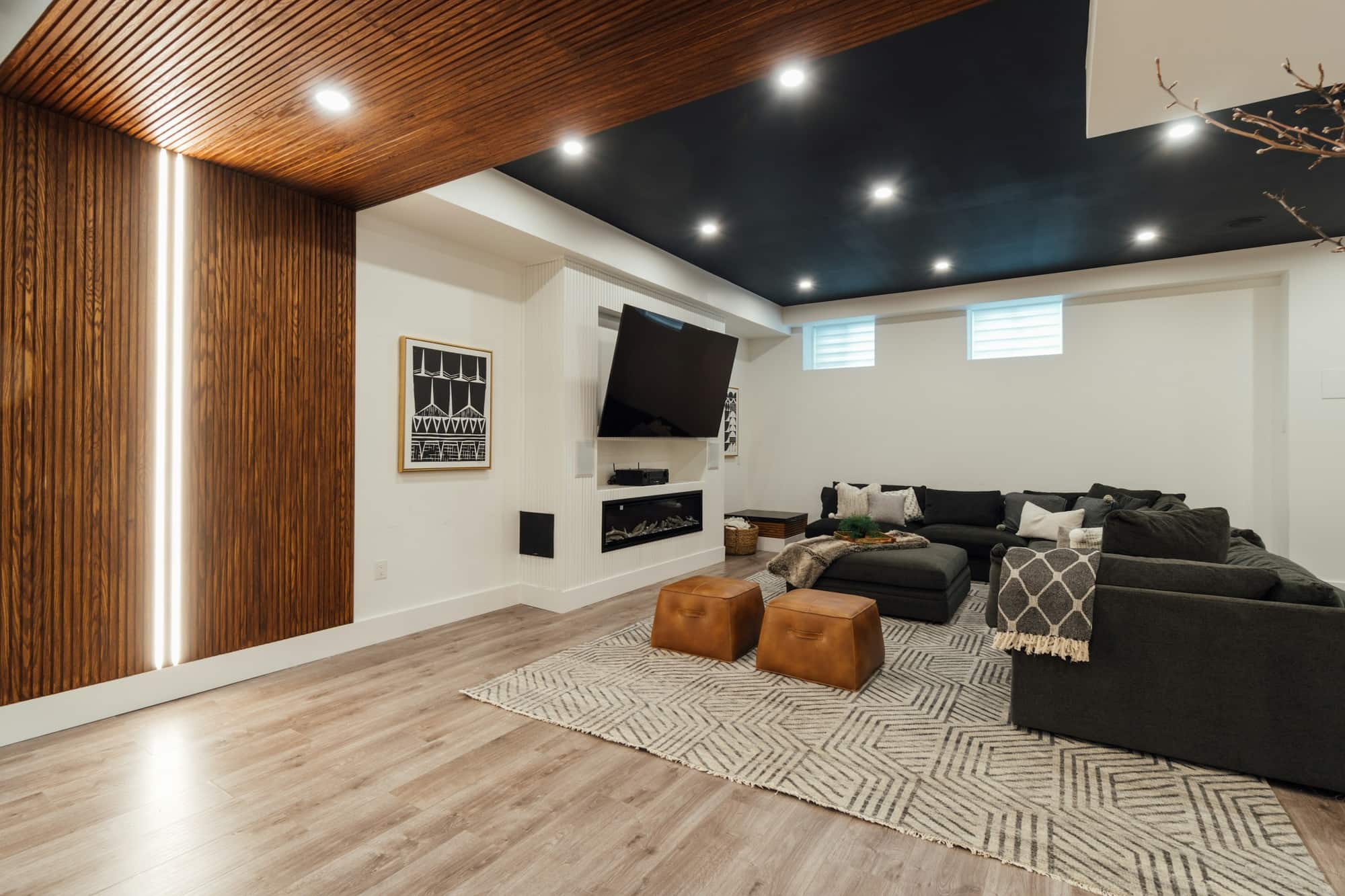 Finished interior room with seating and soft overhead lighting